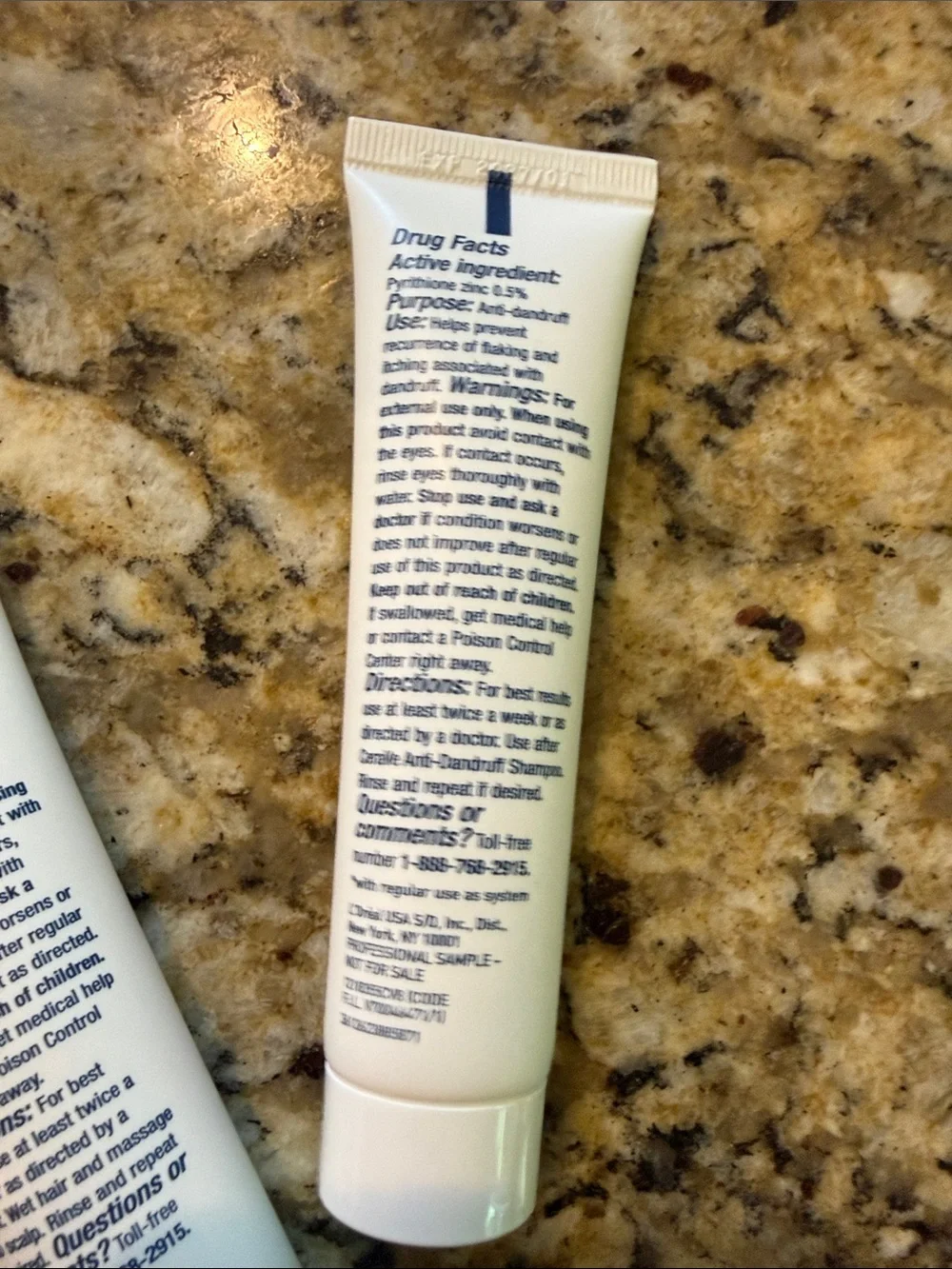 rave White Tube with Blue Accents Shampoo
